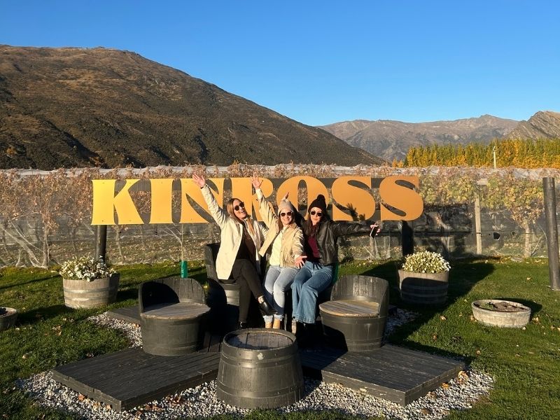 Guests enjoying a boutique Queenstown wine tour in autumn